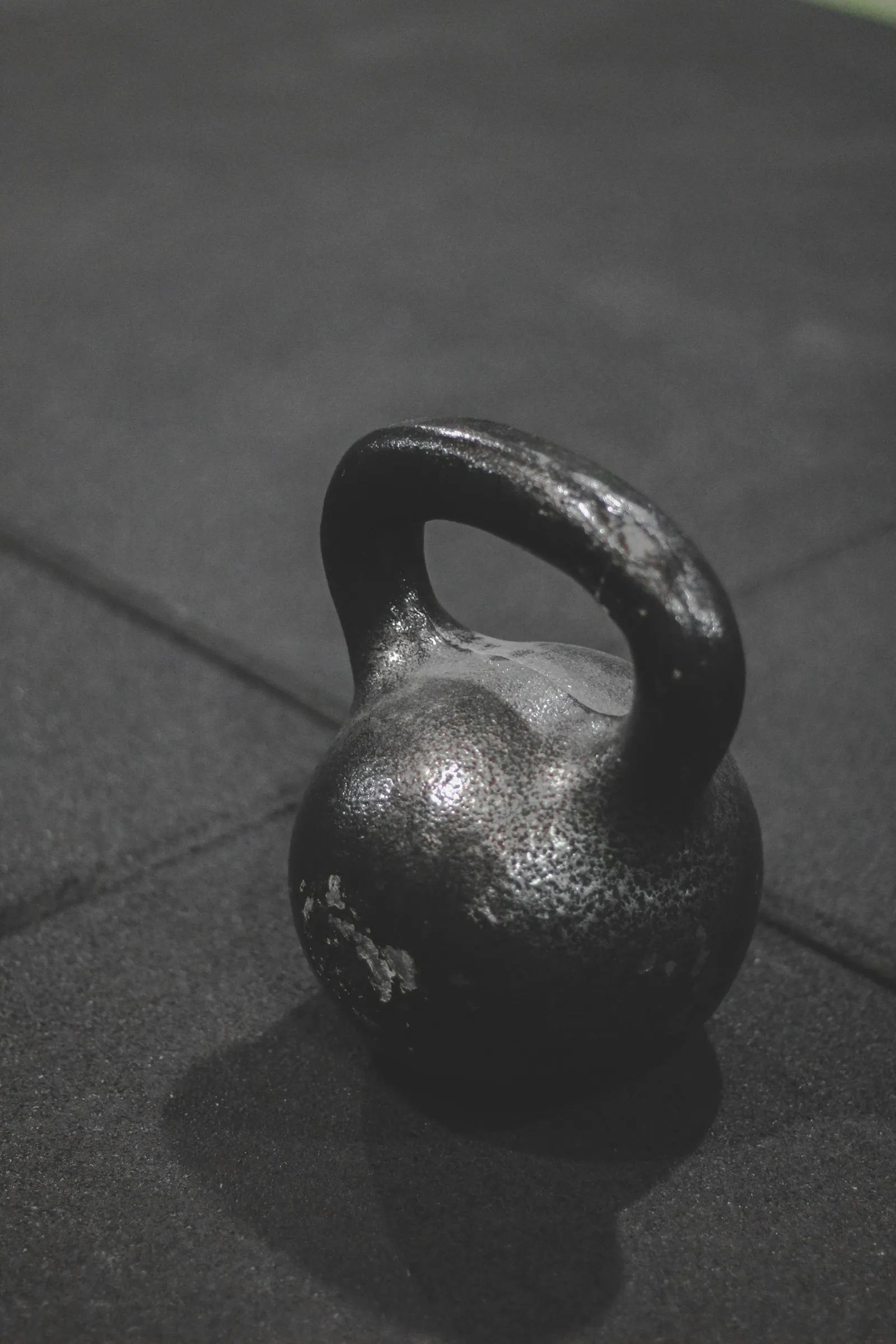 A single cast-iron kettlebell against a clean background